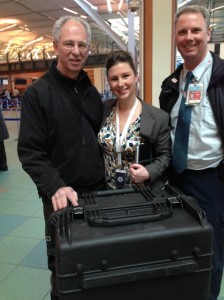 photo - Temple Sholom president David Schwartz, left, May Saunders, Air Canada manager passenger services at YVR, and Kevin L. Patterson, Air Canada customer service manager at the airport.