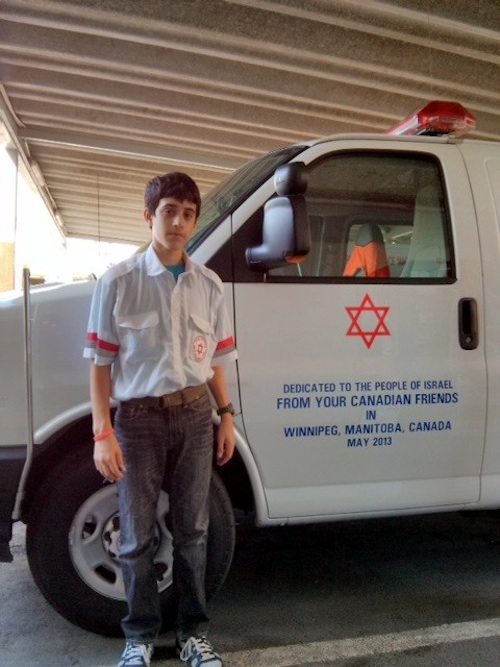 photo - Dror Fuchs with Winnpeg-donated ambulance