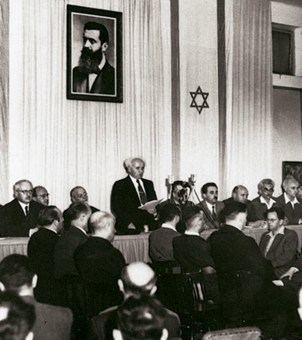 photo - Israel's first prime minister, David Ben-Gurion, pronounces the Declaration of the State of Israel on May 14, 1948, in Tel Aviv
