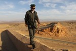 photo - An Israeli border policeman patrols the area of the Judean desert, near the Jordan border. After swift victories in Iraq, the Islamic State in Iraq and Greater Syria (ISIS) terrorist group is setting its sights on Jordan, threatening to drag Israel into the global jihadist conflict