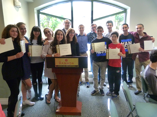 photo - Graduates of NCSY’s Impact leadership program at the spring regional awards banquet in Harrison Hot Springs, with Rabbi Samuel Ross