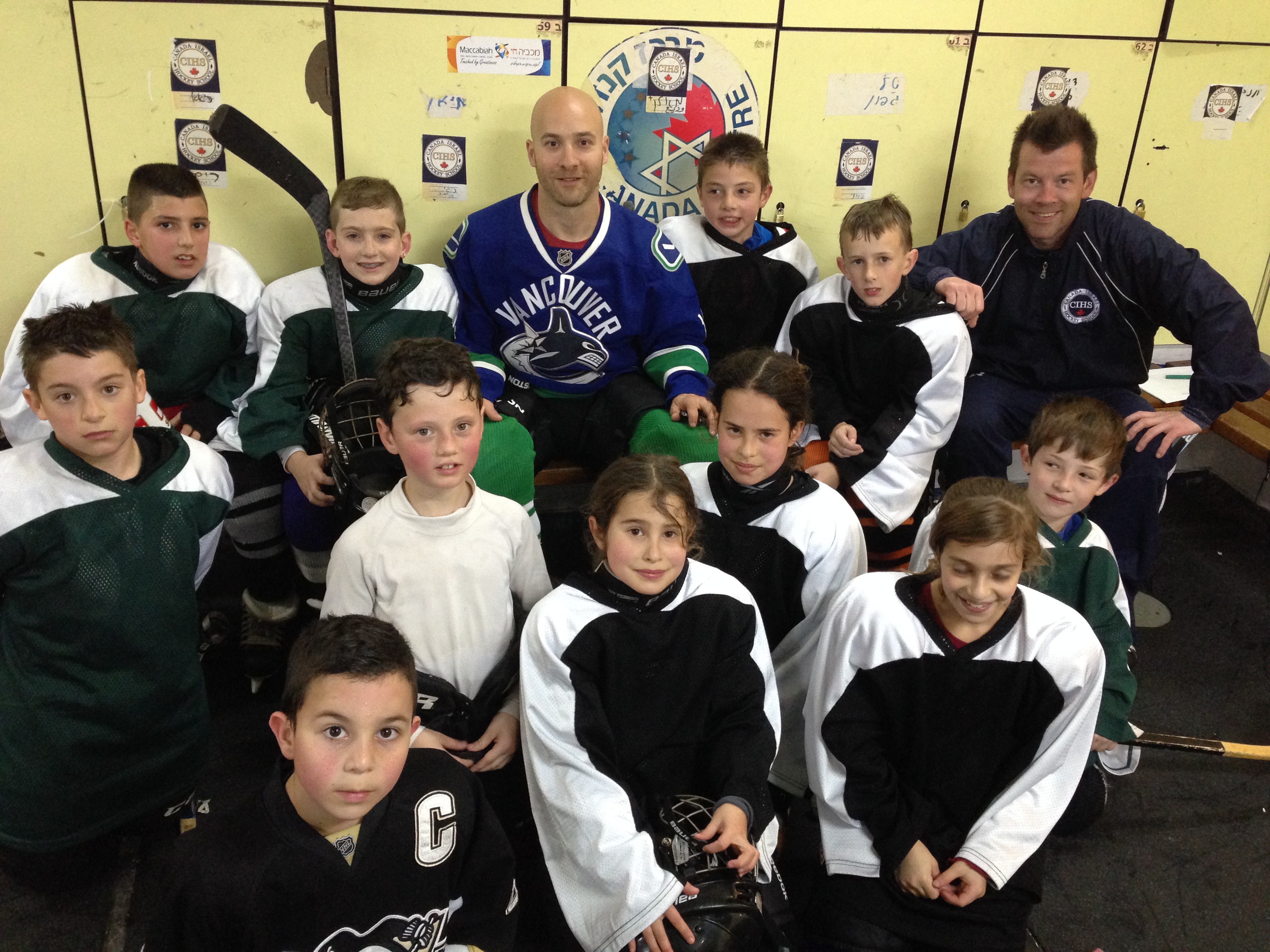 photo - My new friends! A mixed group of Arab and Jewish kids playing hockey together in Israel