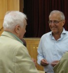 photo - Prof. Shlomo Hasson of the Hebrew University of Jerusalem speaks with audience member Marvin Weintraub after his presentation on Israel's geopolitical situation