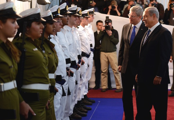 photo - Stephen Harper & Binyamin Netanyahu at Ben-Gurion Airport in January 2014.