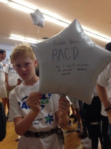 photo - Zevi Kline with a “You’ve been RAC’d!” balloon