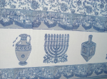 photo - Shlomo and Hagar Yekutieli’s tablecloths feature many different designs, including Chanukah and other holiday motifs