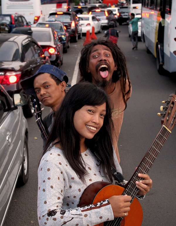 photo - Left to right, Boni Putera, Titi Juwariyah and Bambang “Ho” Mulyono are the charismatic musicians at the heart of Daniel Ziv’s (inset) documentary Jalanan