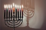 Reb Cantor discovers that some families, like Chelm’s Gold family, light eight candles on the first night of Chanukah