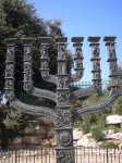 photo - Many scholars believe that the menorah is a stylized version of a tree. The Knesset Menorah, pictured here, was built by Jewish sculptor Benno Elkan, and presented to Israel by the U.K. parliament in 1956