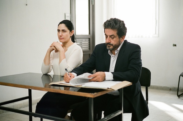 photo - Viviane (Ronit Elkabetz) and Carmel (Menashe Noy) in Gett