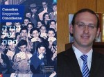 image - The cover of the new Haggadah, with one of its authors, Rabbi Adam Scheier