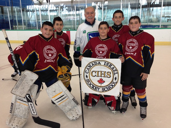 photo - Canucks alum Eddie Hatoum, originally from Lebanon, with several Arab Israeli athletes