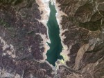photo - A July 2014 Planet Labs satellite image of a reservoir in California’s Lake County that supplies water to nearby Yolo County. In a non-drought year, according to Planet Labs, the visible water would cover roughly twice the area as it does in this picture