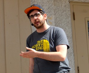 photo - Zach Fleisher in front of what used to be the building housing the city’s Hebrew Sick Benefit Association