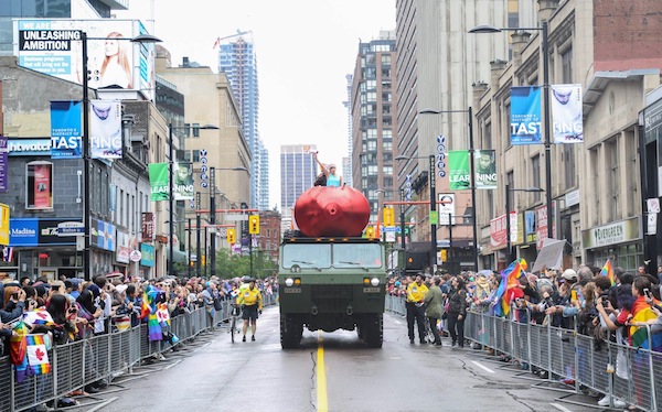 photo - Hundreds of thousands came out to watch Toronto’s Pride Parade on June 28 despite the inclement weather