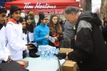 photo - The Shia Ismaili community, St. Augustine’s Catholic School and Vancouver Talmud Torah students assembled gifts of hope and compassion, and distributed them – along with 2,000 servings of food items courtesy of Tim Horton’s – to residents on the Downtown Eastside