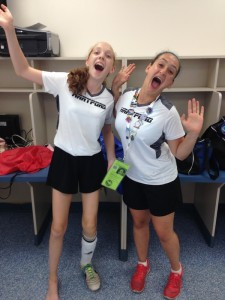 photo - Rachel Bugis, left, and Magalee Blumenkrans celebrate after a big soccer victory