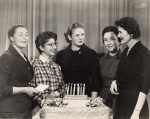 photo - Women gathered around a table with a candled cake, National Council of Jewish Women, circa 1955. Leonore Freiman is in the middle