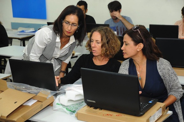 photo - Teachers at WIZO Hadassim with the new computers