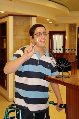 photo - Oz Attal participated in the school’s Chanukah celebrations this year