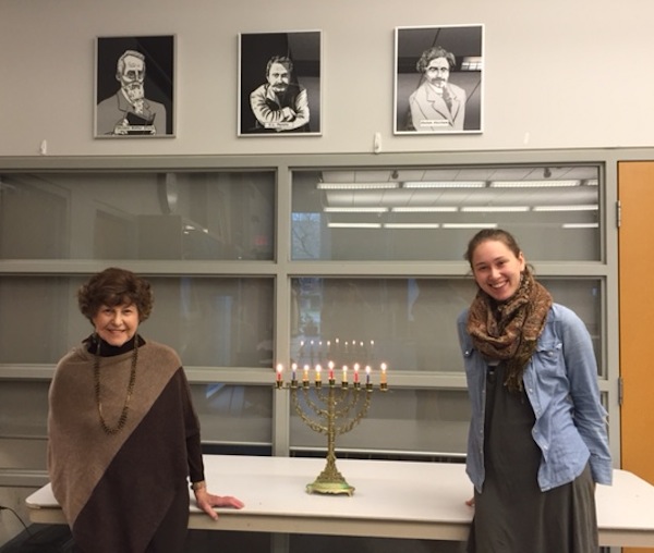 photo - Flora Field, left, and Emily Glass, students learning Yiddish with Haya Newman at the Peretz Centre for Secular Jewish Culture, take time out for Chanukah