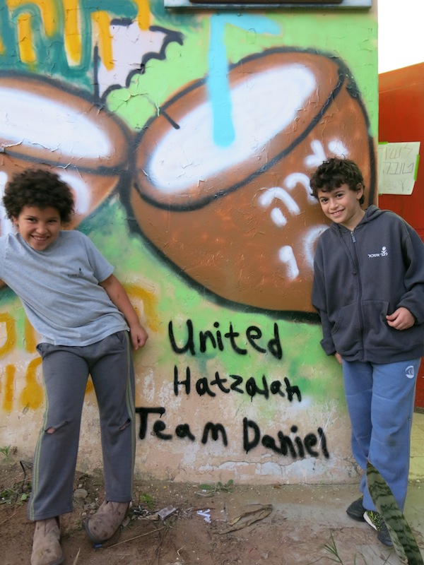 photo - United Hatzalah of Israel and Artists 4 Israel distributed art therapy kits to families in southern Israel and held a program that included visits by graffiti artists who worked with teens to paint neighborhood bomb shelters
