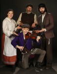 photo - Jewish community members in Royal City Musical Theatre’s production of Fiddler on the Roof, left to right: Erin Palm, Warren Kimmel and Zach Wolfman, with Michael Wilkinson in front. The show runs April 7-23 at Massey Theatre