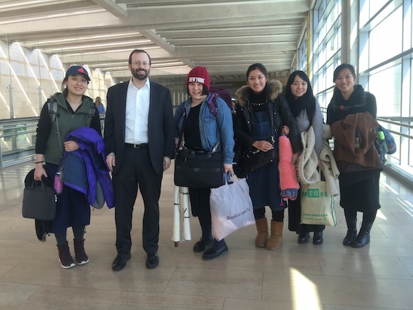 photo - Shavei Israel founder and chair Michael Freund greeted the five women from Kaifeng – left to right, Gao Yichen, Li Chengjin, Li Yuan, Yue Ting and Li Jing – at Ben-Gurion Airport on Feb. 29