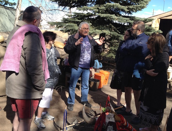 photo - Casey Eagle Speaker welcomes Beth Tzedec’s interfaith learning group to a sweat lodge