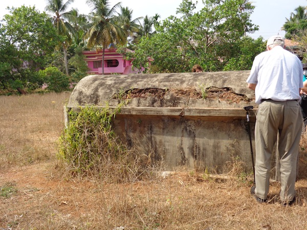 photo - Mala Jewish cemetery, one of three graves left intact. The villa can be seen in the background