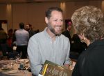 photo - Hootsuite’s Ryan Holmes speaks to an attendee at the Innovators Lunch on May 4