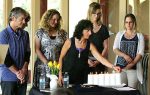 photo - Left to right: Evan Orloff, Melina Moore, Barb Pullan lighting the candles, Rebecca Morlang and Hilla Shlomi
