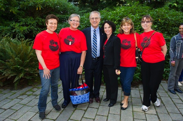 photo - Left to right are Anne Andrew, Marie Henry, Stephen Lewis, Joyce Cherry, Darcy Billinkoff and Dawn Alfieri at the African Grandmothers Tribunal, which was held in 2013 at the Chan Centre