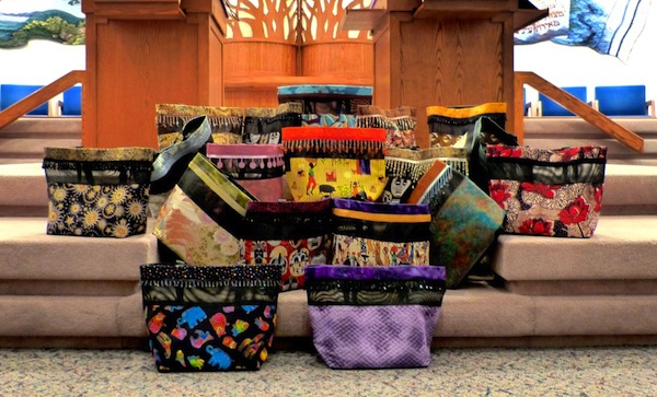 photo - Totes made by Tikun Olam Gogos, and other Gogos, will be on sale at the Voices for Africa fundraiser on June 15