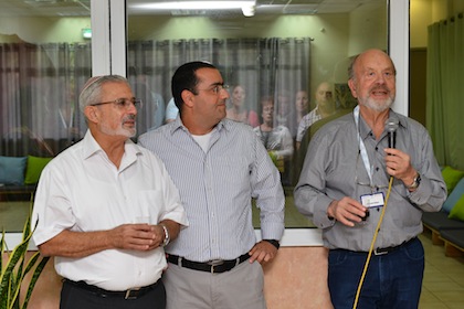 photo - At the launch of the Friends of Beit Vancouver recognition wall on a mission led by Anita and Arnold Silber, Arnold Silber addresses the audience. He is joined by, left to right, Nissim Malka, mayor of Kiryat Shmona, and Eran David from Jewish Federation of Greater Vancouver’s Israel office