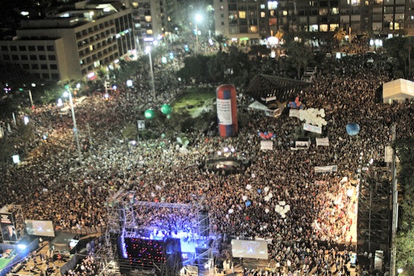 photo - In Tel Aviv in October 2015, thousands of Israelis came together to remember the 20th anniversary of the assassination of Yitzhak Rabin, who was murdered by Yigal Amir in this square