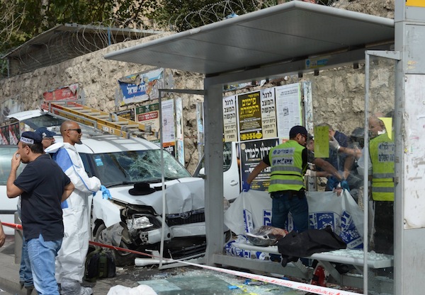 photo - A bus stop in Jerusalem’s Malkei Yisrael Street after a terrorist drove his car into the stop, killing one man, and then got out of his vehicle to stab others at random