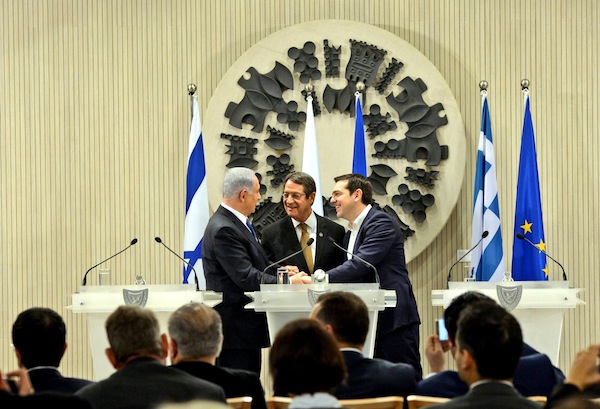 photo - Prime Minister Binyamin Netanyahu, left, Cypriot President Nicos Anastasiades, centre, and Greek Prime Minister Alexis Tsipras at a meeting in Nicosia to cement trilateral relations