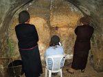 photo - Women praying in the Western Wall tunnels