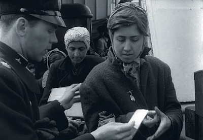 photo - Hinda Jakubowicz stepping off the ferry in Malmö on April 28, 1945