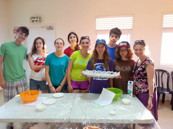 photo - Teens from Temple Sholom’s sister congregation, Tzur Hadassah, in Israel. Rabbi Stacey Blank is on the far right
