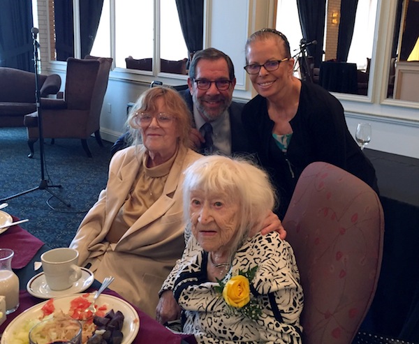 photo - Janice Middleman, left, Rabbi Shaul Osadchey and Bobbie Osadchey, with Florence Middleman in the foreground