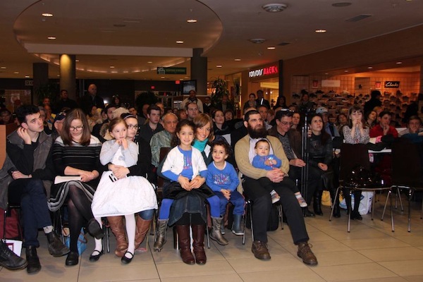 photo - Semiahmoo Shopping Centre was filled on Dec. 29 for the menorah lighting, which was done by Cantor Yaakov Orzech, and the awarding of the 2016 Lamplighter Award to Jason Aginsky (below), among other festive activities