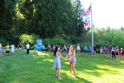 screenshot - Screenshot from a 2014 Camp Solomon Schechter promotional video. While swimming and other secular activities engage campers, so do Shabbat and Israel