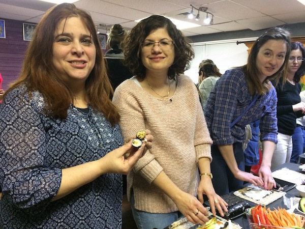 photo - It’s no secret Vancouverites love sushi but, after the Bayit’s Ladies’ Sushi Night, held on Jan. 12, there are at least 50 women who can now make their own! The event was organized by Rivky Varnai and Matti Feigelstock. Attendees learned how to make a variety of rolls before enjoying the fruits of their labour. Pictured here are sushi-makers, left to right, Liorah Johnson, Naama Shafran-Matis, Yelena Novikov and Ayana Honig