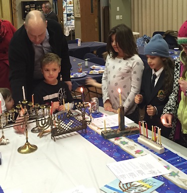 photo - The Okanagan Jewish community’s Chanukah celebration Dec. 12