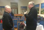 photo - Jewish Genealogical Society of British Columbia member Danny Gelmon, left, speaks with Hal Bookbinder