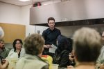 photo - Michael Schwartz, director of community engagement at the Jewish Museum and Archives of British Columbia, speaks to guests at a Chosen Food Supper Club gathering
