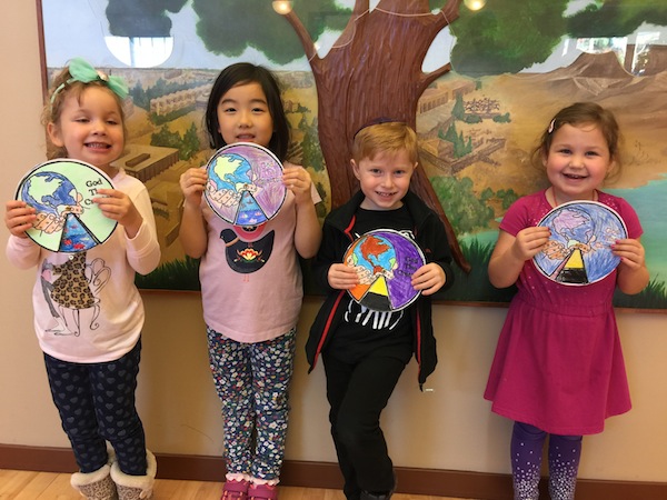 photo - Students in Kitah Aleph at the White Rock / South Surrey Jewish Community Centre with their Bereishit (Genesis) craft that they completed after studying the parashah at the centre’s religious school