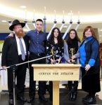 photo - Left to right are Rabbi Falik Schtroks, Jason Aginsky, Jessie Miller, Emily Miller and Rebbetizin Simie Schtroks